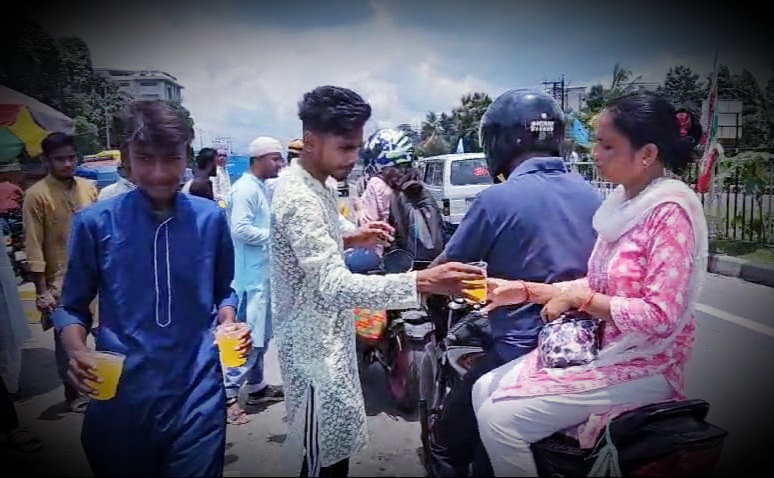 Voluntary organization distributing sherbet to passersby on Muharram in Fulbari