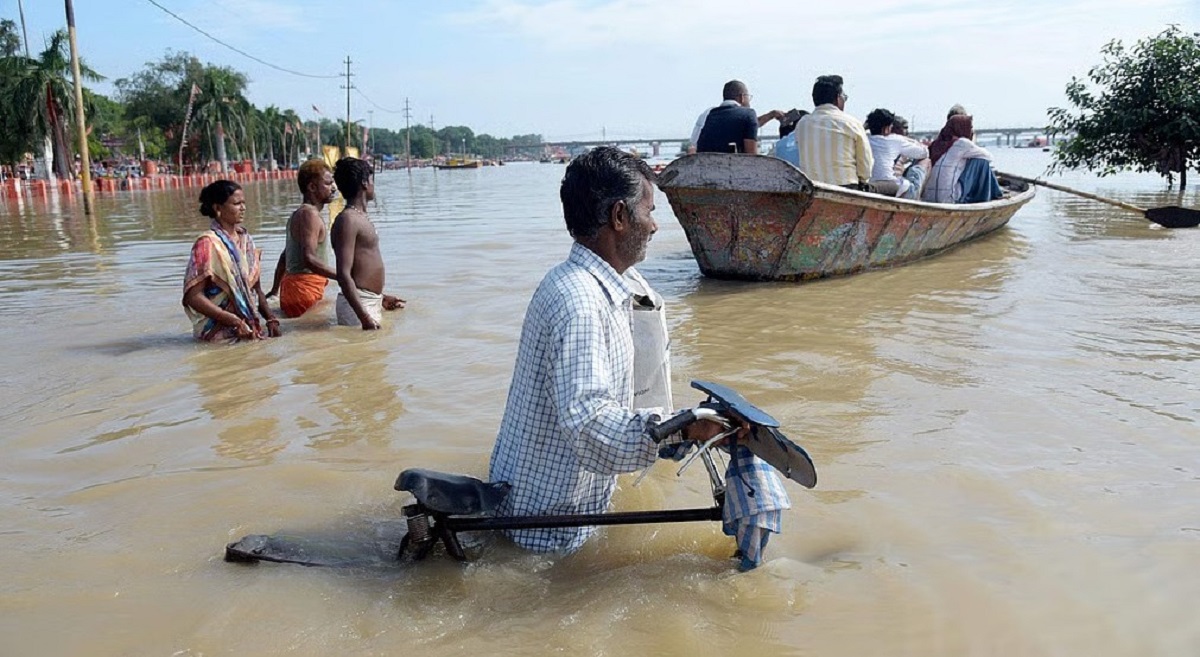 A warning mark is crossed by the Ganges as floodwaters rise, NDRF on high alert
